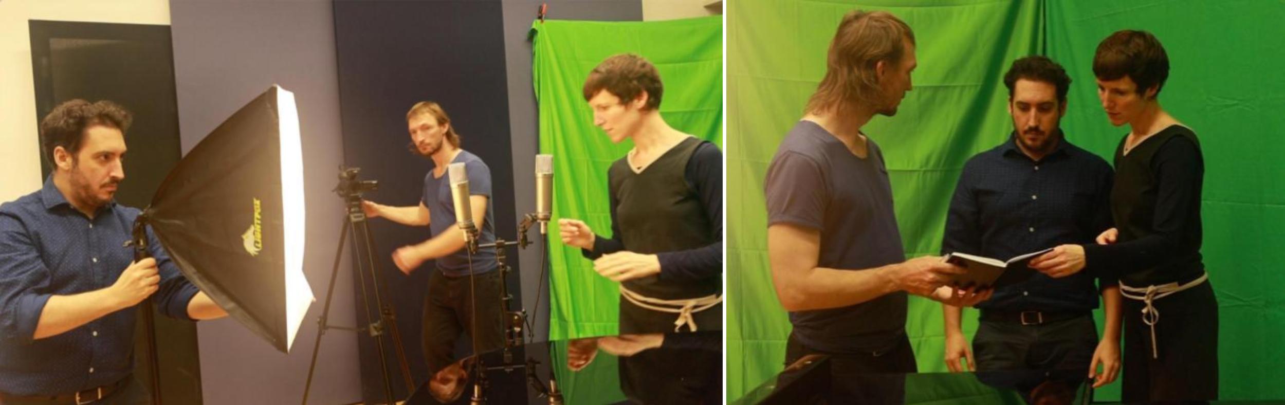 Three men in a studio setting, one adjusts a light, another operates a camera, and two others discuss notes by a green screen, appearing focused and collaborative.