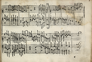 Printed page from a sixteenth-century keyboard composition by Girolamo Cavazzoni. The image shows two systems of dense black notation with overlapping contrapuntal lines and chordal writing. The vertical alignment of the notes is uneven, characteristic of early movable-type printing, and the page shows slight discoloration from age. Dots appear both as accidentals and as dots of addition, reflecting notational conventions of the period.